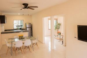 Телевизор и/или развлекательный центр в Casa vacacional para disfrutar en familia