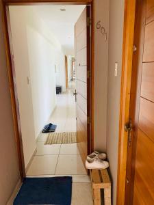 a hallway with a door leading into a room at Spacious apartment in Miraflores in Lima