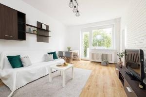 Posedenie v ubytovaní Roomsy Świętojańska