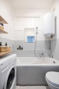 Kúpeľňa v ubytovaní Roomsy Świętojańska