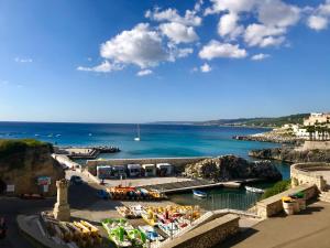 a view of a harbor with boats in the water at Bed & Breakfast Acquamarina in Castro di Lecce