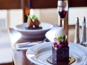 a piece of chocolate cake with an egg on a table at Brougham Arms Hotel in Bendigo +23 photos