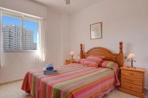 Postel nebo postele na pokoji v ubytování Valdelagrana: primera línea de playa. + 12 fotografií