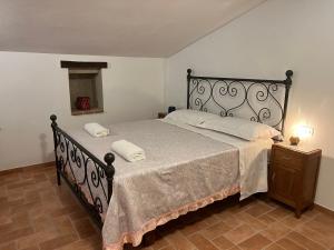 Postel nebo postele na pokoji v ubytování Casa Garoselli