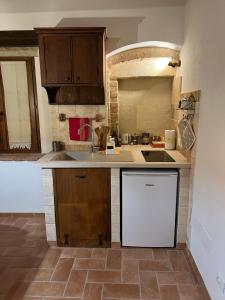 Kuchyň nebo kuchyňský kout v ubytování Casa Garoselli