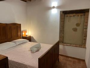 Postel nebo postele na pokoji v ubytování Casa Garoselli