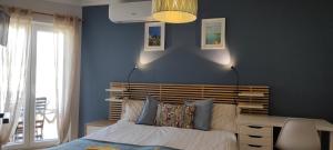 Giường trong phòng chung tại In My Apartement Baleal +14 ảnh