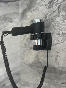 Fotografia z galérie ubytovania Capsule Art Déco - Jacuzzi - Netflix - Home Cinéma - Arcade de jeux & Nintendo switch - 2 chambres - Filet suspendu v destinácii Valenciennes