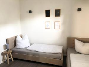 Giường trong phòng chung tại *Premium-Apartment im Spreewald*