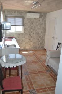 Cama o camas de una habitación en APARTAMENTO EN OLVERA CON GARAJE