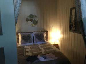 Posteľ alebo postele v izbe v ubytovaní Sweet home, logement de tourisme