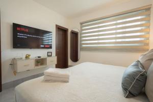 Imagine din galeria proprietății Soha suites I în Santiago de los Caballeros +60 fotografii