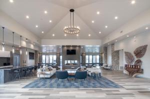 a large living room with a couch and a table at Verde Ranch RV Resort in Camp Verde
