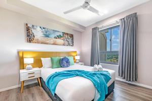 Voodi või voodid majutusasutuse Arafura Edge - Resort Living and Breathtaking Views toas