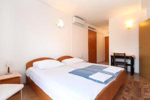Postel nebo postele na pokoji v ubytování Apartment Slano 2682c