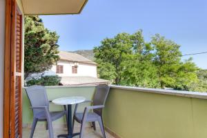 Balkón alebo terasa v ubytovaní Apartments and rooms with parking space Nerezine, Losinj - 2506