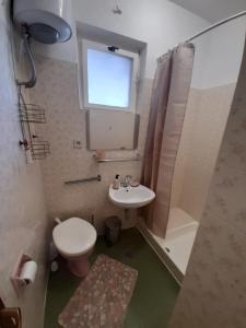 Kúpeľňa v ubytovaní Apartments and rooms by the sea Podgora, Makarska - 2616 + 37 fotografií