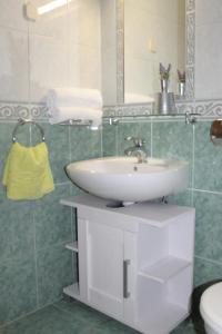 a bathroom with a sink and a mirror at Apartment Zaostrog 2625a in Zaostrog