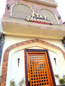 a building with a sign above a door at Stay Shaandaar a boutique hotel Amritsar in Amritsar