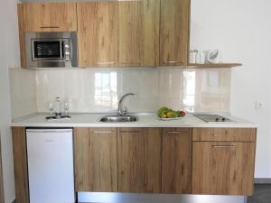 Kuchnia lub aneks kuchenny w obiekcie Apartamentos Santa Rosa