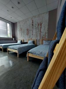 Gulta vai gultas numurā naktsmītnē Hostelis R27