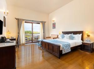 Sarasiruham Resort - Private Pool Villa in Udaipur客房内的一张或多张床位