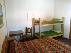 Ένα ή περισσότερα κρεβάτια σε δωμάτιο στο Tree House Hostel