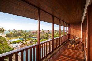 a balcony with a view of the ocean at Cinnamon Bentota Beach - Signature Selection in Bentota