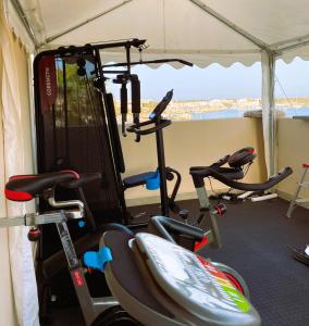 a group of exercise bikes in a tent at Hotel Medusa in Lampedusa