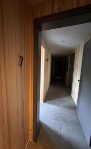 a hallway in a house with a door open at Haus Bergquell App 7 in Willingen