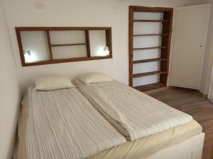Кровать или кровати в номере Estudio