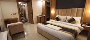 Katil atau katil-katil dalam bilik di Hotel Sakura by Maps