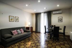 Khu vực ghế ngồi tại Appartamento Catania centro