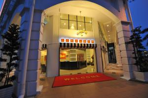 a welcome mat in front of a building at Your Hotel Klang by D'concept in Klang