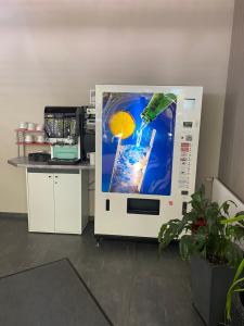 a machine with a picture on the side of it at Hotel am Westend in Lahr