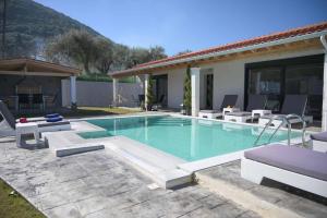 The swimming pool at or close to Diamond Luxury Villa Corfu