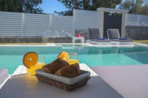 The swimming pool at or close to Diamond Luxury Villa Corfu