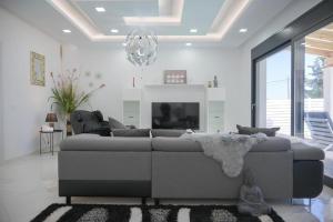 A seating area at Diamond Luxury Villa Corfu