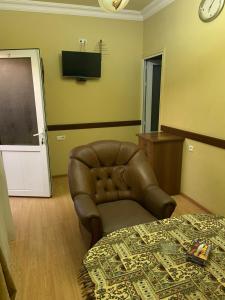TV a/nebo společenská místnost v ubytování Tnak Hotel