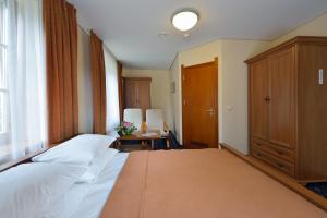 Cama o camas de una habitación en Rehabilitation Centre & SPA Draugystės sanatorija