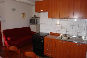 Zdjęcie z galerii obiektu Apartments by the sea Mandre, Pag - 12969 w mieście Kolan