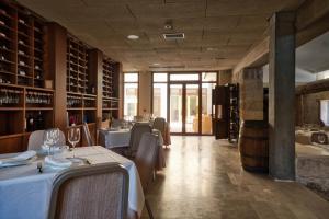 Reštaurácia alebo iné gastronomické zariadenie v ubytovaní Hotel La Vida Spa