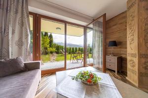 Posedenie v ubytovaní Oliwkowy, Apartament widokowy z dużym tarasem
