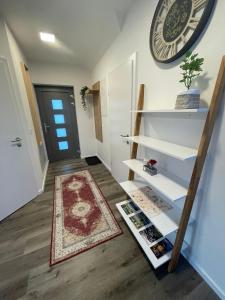 a hallway with white shelves and a door at Sorinas Unterkunft WB16 Top 15 