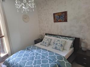 Posteľ alebo postele v izbe v ubytovaní CasaMG