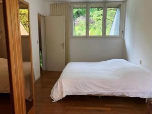 Łóżko lub łóżka w pokoju w obiekcie Villa au cœur des vignes de Chavignol
