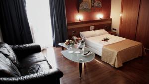 Postel nebo postele na pokoji v ubytování Hotel Iris