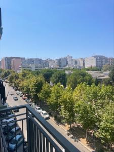 a view of a city with cars parked on a street at B&B New Paris & Suite in Taranto