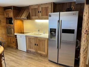 Kuchyňa alebo kuchynka v ubytovaní La Dorbluche duplex apartment 10-11 person