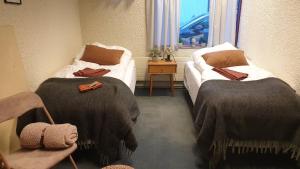 Postelja oz. postelje v sobi nastanitve The Bank Sleeping Guesthouse